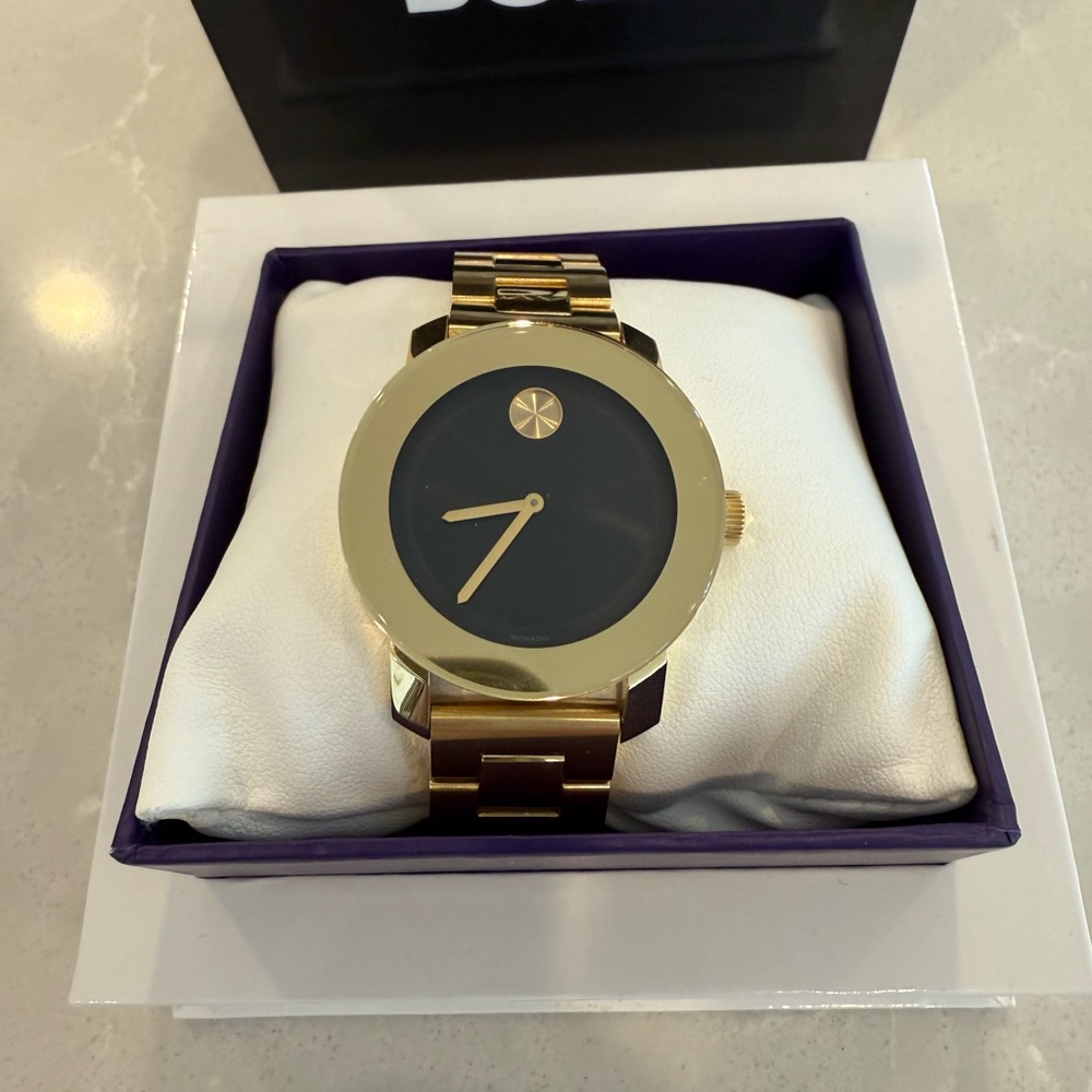 Movado Gold and Black Timepiece